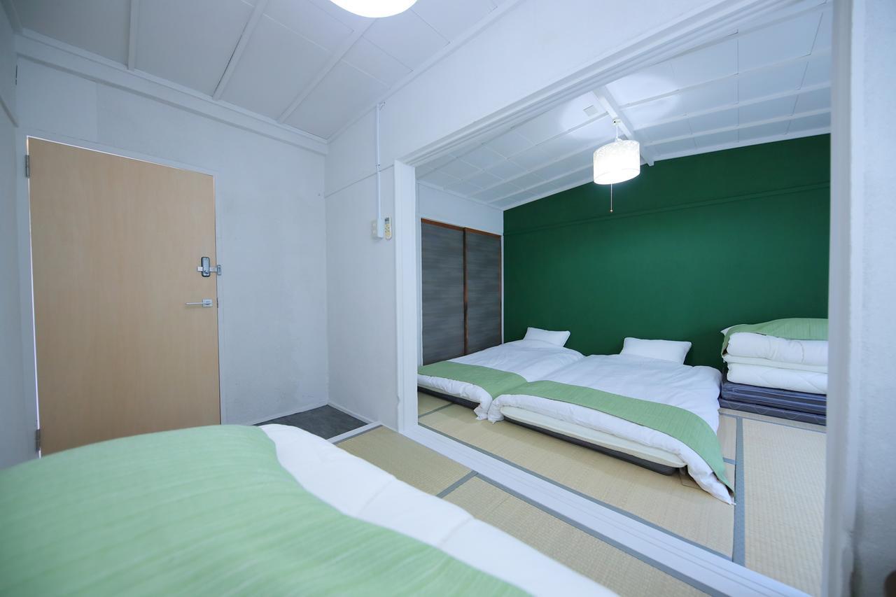 Raku Hostel Ōsaka Exterior foto